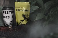 Coffee cup and coffee bag in forest