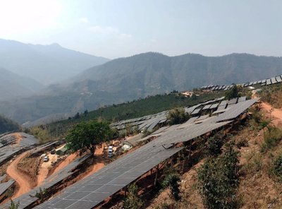 Rows of solar panels lining Pu’er City’s mountains